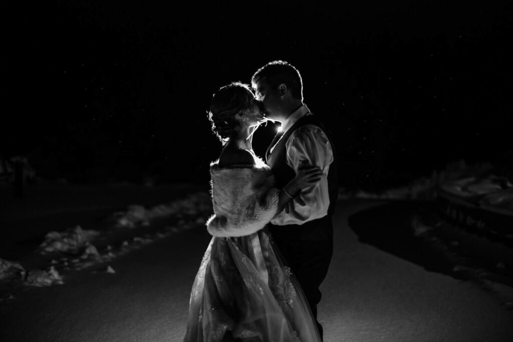 winter wedding night portraits of bride and groom