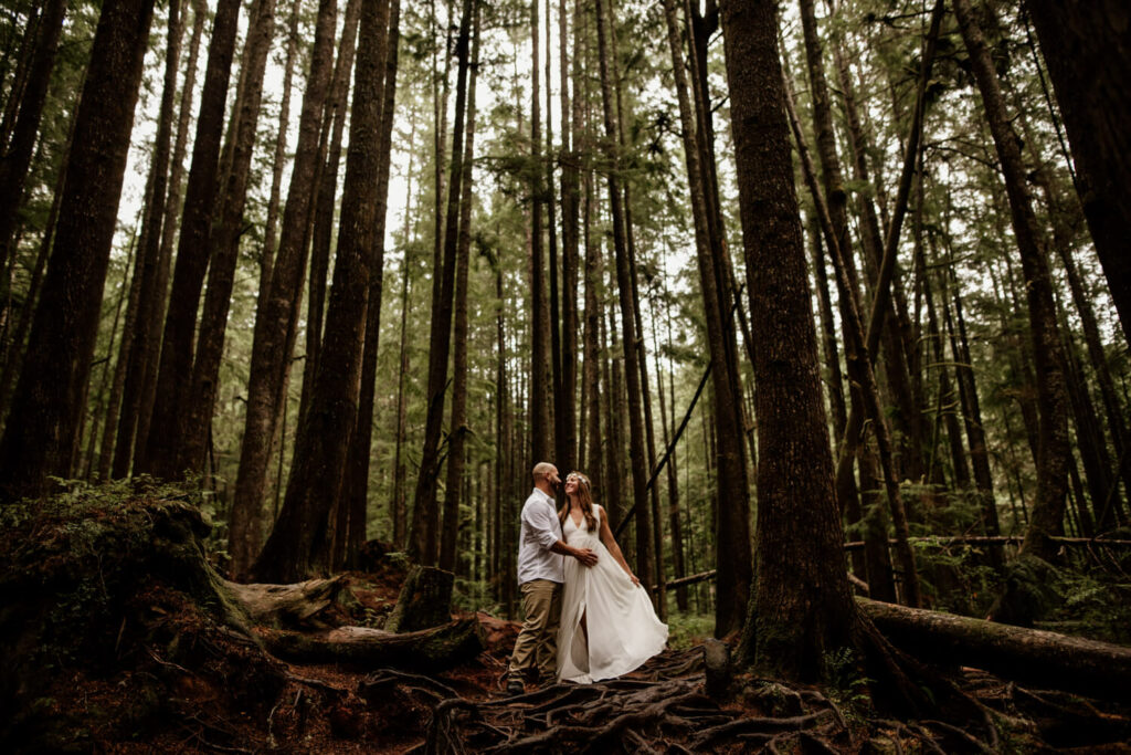 bride and groom on the mystic beach trails after their wedding