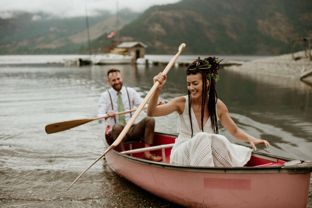 bride and groom in a canoe