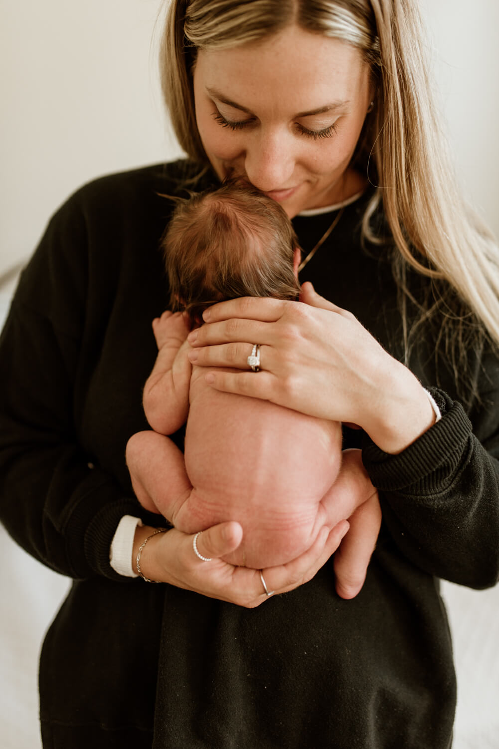 mom holds new baby