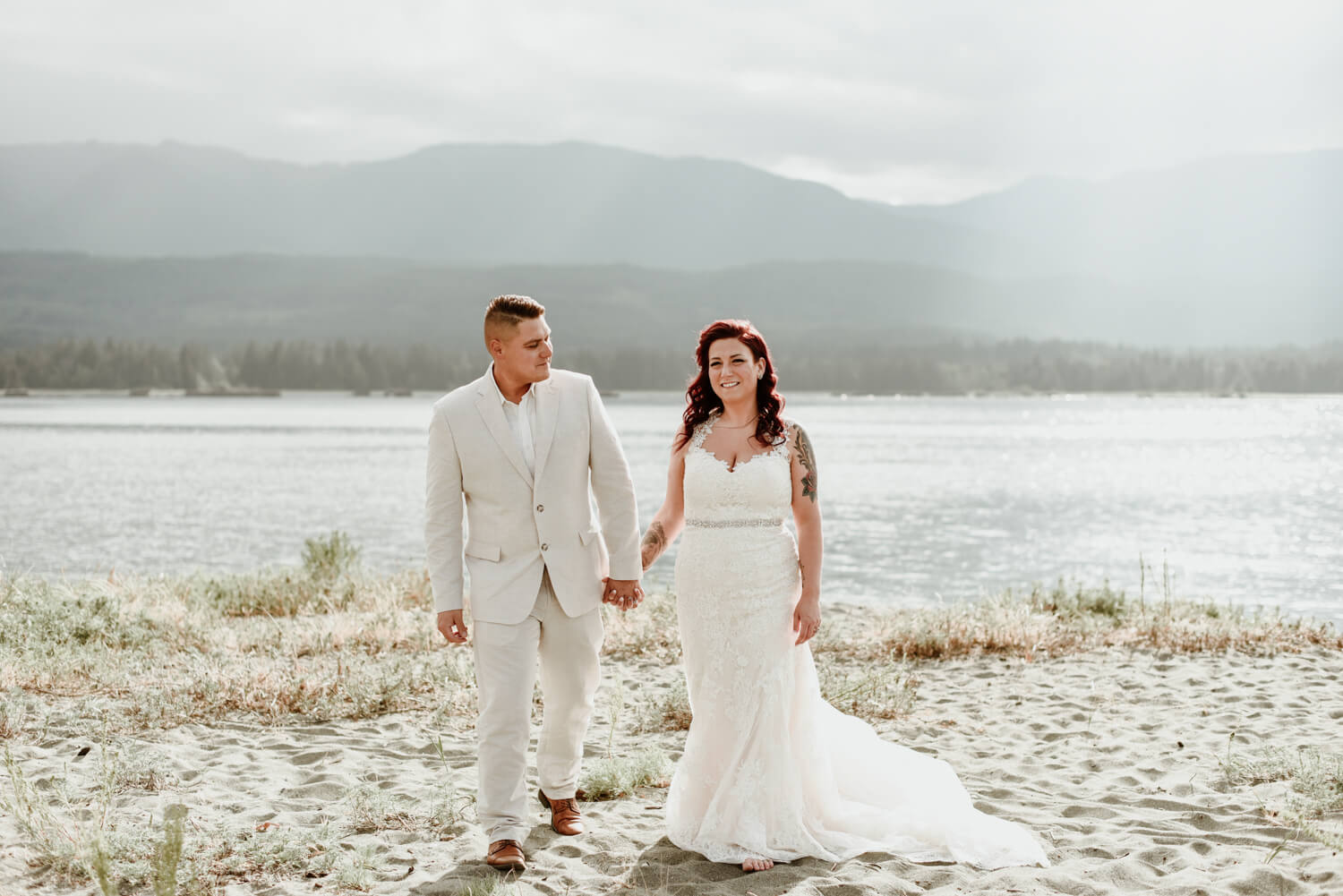 bride and groom walking on Vancouver island beach
