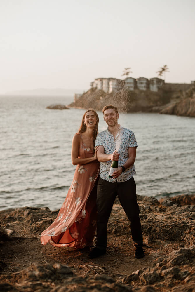 bride and groom take a champagne pop photo