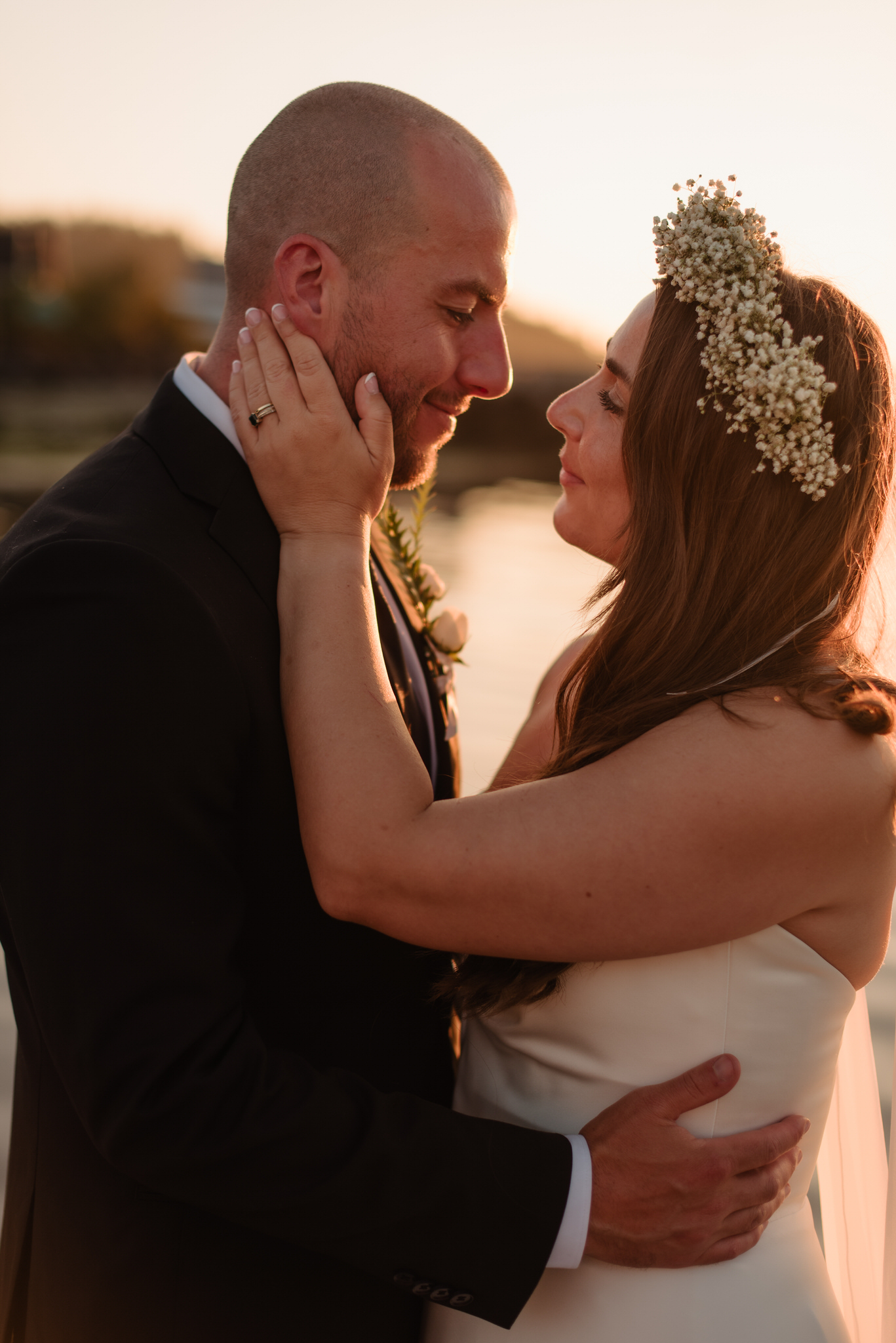 The bride and groom on the docks downtown Tofino for sunset portraits