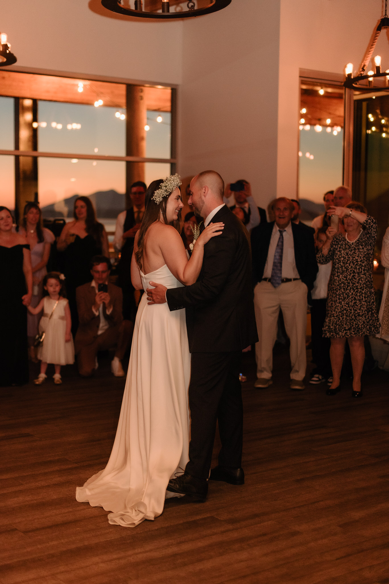 The bride and groom's first dance inside the Shore Pier venue