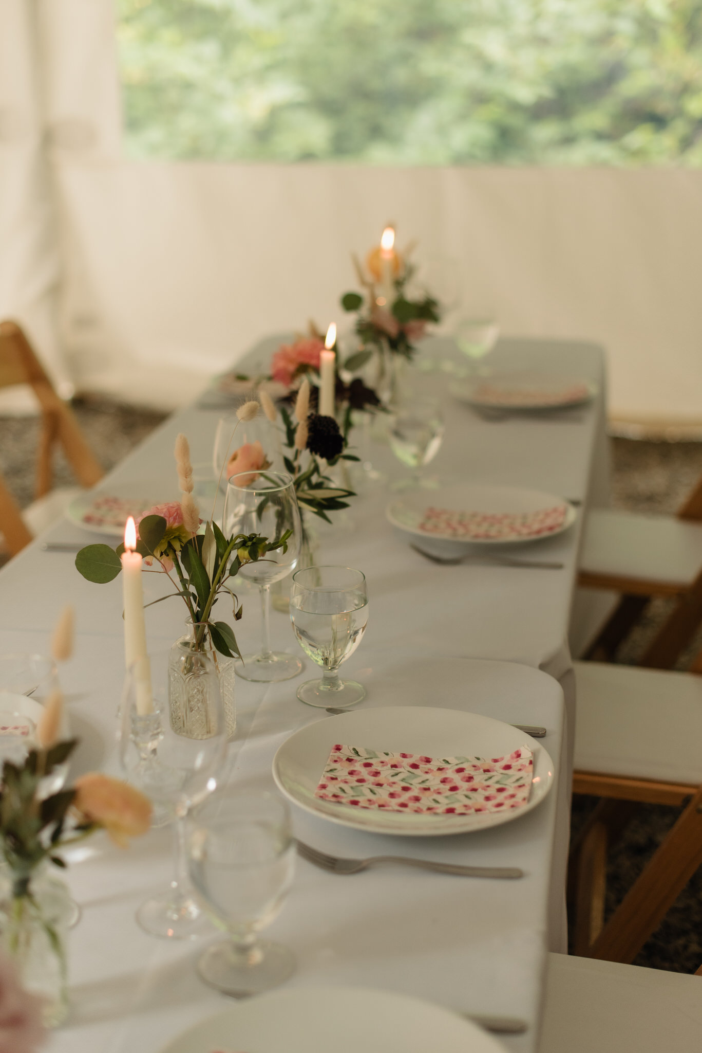 Inside the rainforest wedding reception tent at Pacific Sands