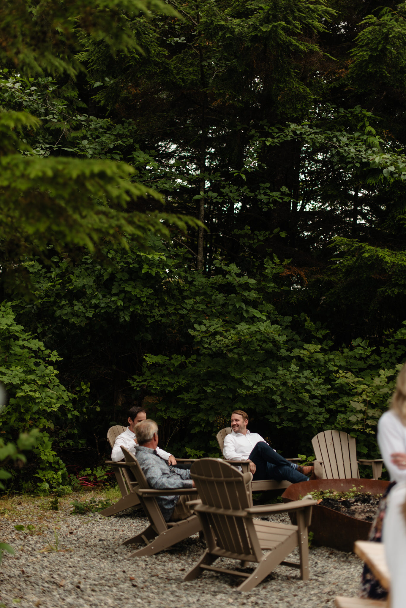 Guests hanging out in the rainforest during the wedding reception